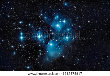 Pleiades open star cluster (also known as The Seven Sisters) Royalty-Free Stock Photo #1912575817
