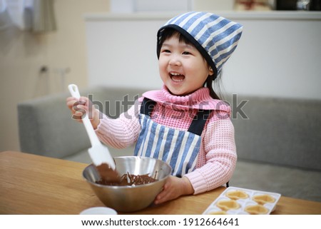 Image of a girl making sweets 