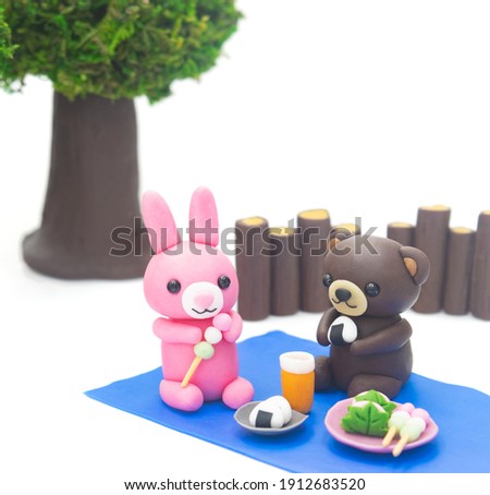 Bear and rabbit having a picnic in the forest.
Dolls and objects self-made in clay.
