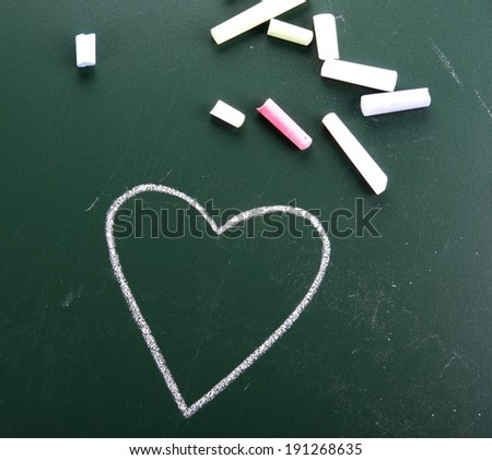 Hand drawn Heart with chalk on drawing desk