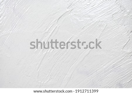 The flesh is white. Wall background with plaster and stain Screensaver or postcard for presentations