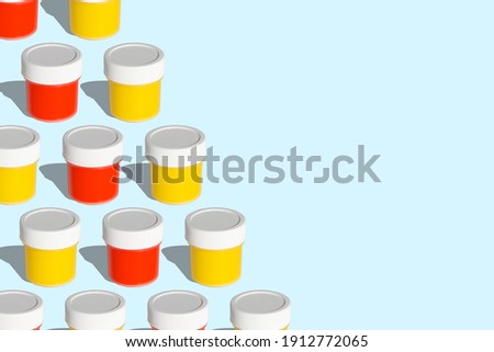 Seamless pattern from cans with yellow and red gouache on a blue background copy space