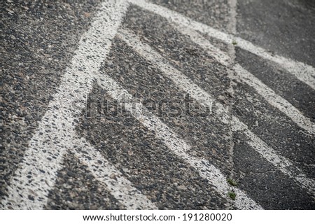 Traffic road white painting prohibited area sign on grey asphalt
