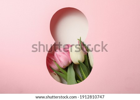 Paper cut Eight made of pink background and tulips on white background Royalty-Free Stock Photo #1912810747