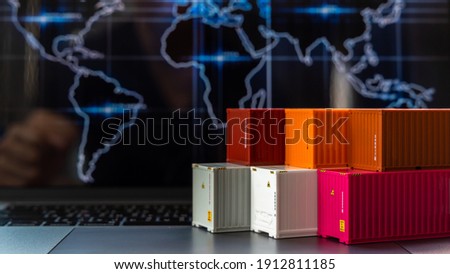 Global business container cargo ship in import export business logistic, Company shipping delivery and logistics technology business industrial, Container on computer laptop notebook selective focus. Royalty-Free Stock Photo #1912811185