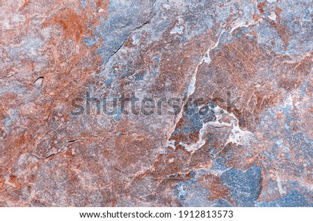 Textured granite stone surface close up. Natural granite stone for laying on the floor.
Stone background for high resolution wallpaper. 