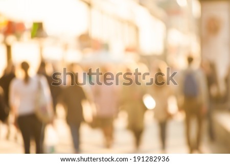 City commuters. High key blurred image of workers going back home after work. Unrecognizable faces, bleached effect. Royalty-Free Stock Photo #191282936