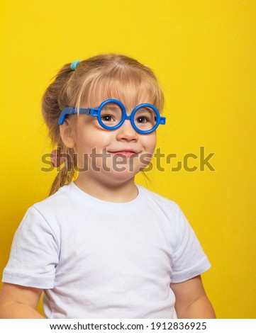 little girl with glasses - portrait with place for text