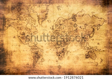 Vintage world map on an old stained parchment Royalty-Free Stock Photo #1912876021