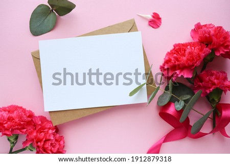  greeting card mockup. bouquet of flowers, envelope and place for text 