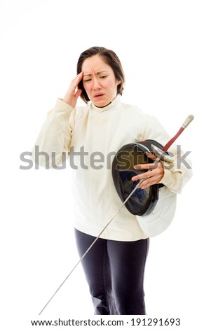 Female fencer suffering from headache