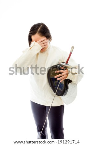 Female fencer looking frustrated