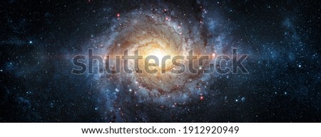 A view from space to a spiral galaxy and stars. Universe filled with stars, nebula and galaxy,. Elements of this image furnished by NASA. Royalty-Free Stock Photo #1912920949
