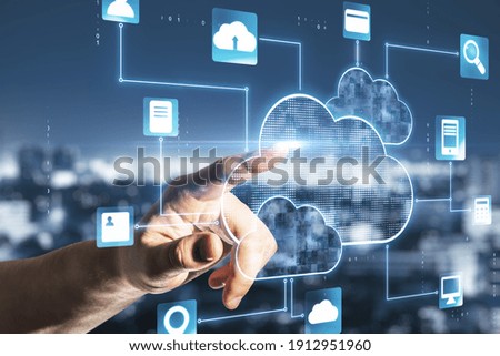 Cloud service concept with man finger touching digital screen with cloud service application icons at abstract city background Royalty-Free Stock Photo #1912951960