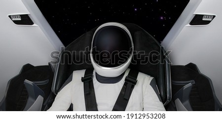An astronaut in a spaceship flying through the outer space on a space mission. Elements of this image furnished by NASA.