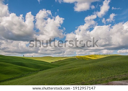 Typical Tuscany Italy landscape fields and farm