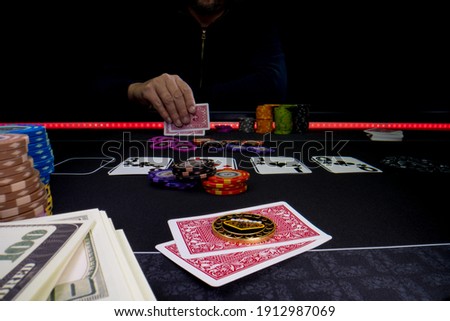 High stakes Texas hold 'em poker game at the casino Royalty-Free Stock Photo #1912987069