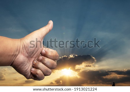 Hand thumbs up Separated from the white background, unclean hands 