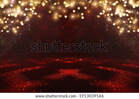 red, black and gold glitter vintage lights background. defocused
