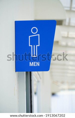 Male toilet sign outdoor background	
