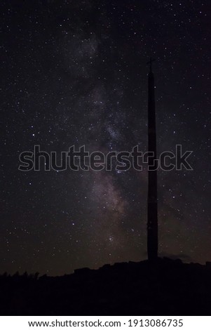 Cruz de Ferro next to the Milky Way in Foncebadon, Leon, Spain.