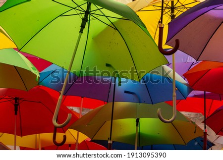 A picture of a bunch of colorful umbrellas on display in Split.