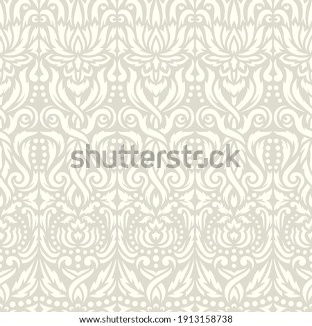 Seamless background with classic pattern. Floral ornament, vertical lines, abstract flowers and leaves. Soft light gray-beige colors. Endlessly repeating texture for fabrics, textiles, wallpaper.