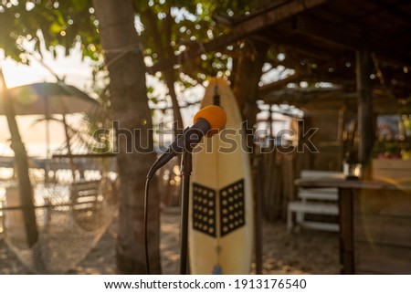 microphone in beach bar during sunset
