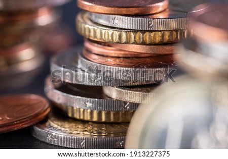 Closeup Euro Coins from European Union Monetary System. Two Euros and Cents. Market and Economics in EU with EUR Royalty-Free Stock Photo #1913227375