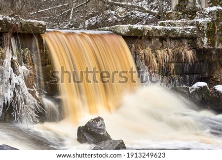  Beautiful waterfall in winter day in Nukarinkoski Nurmijärvi                              