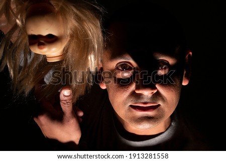 terrifying image of man in shadows