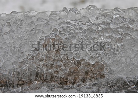 Ice nodules formed from repeating water drops during subzero temperatures.