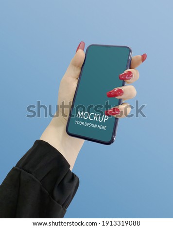 and holding gold phone isolated on white clipping path inside