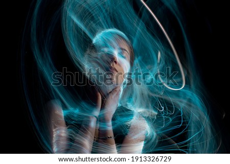 Portrait in the style of light painting. Long exposure photo
