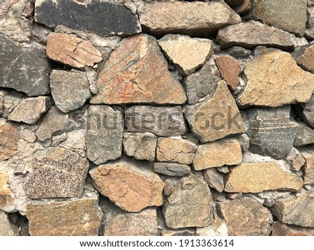 Macro photo stone wall. Stock photo big old stone wall background