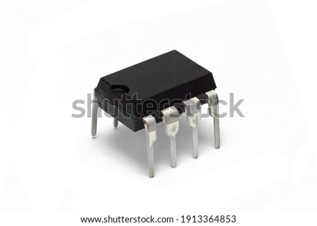 8-pin integrated circuit (IC) chip isolated on white background Royalty-Free Stock Photo #1913364853