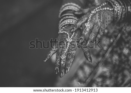 Indian Hindu bride's wedding henna mehendi hands close up