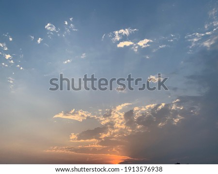 Clouds and the golden evening light of the beautiful sun. no focus