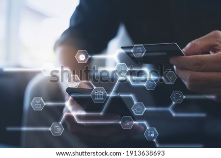 Digital banking, internet payment, online shopping, digital marketing, financial technology Fintech, E-wallet concept. Man using smart phone and credit card for online shopping via mobile banking app