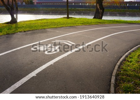 Bicycle's road sign and arrows in park