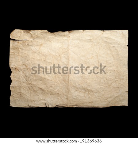 Sheet of old yellow crumpled paper isolated on black