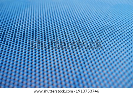 Blue non-slip mat for pools and saunas. Special anti-slip coatings concept Royalty-Free Stock Photo #1913753746