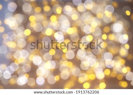 Defocused Lights Background. Golden unfocused light background
