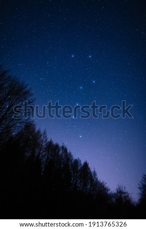 Milky Way stars and starry skies photographed with long exposure from a remote suburb dark location. Royalty-Free Stock Photo #1913765326