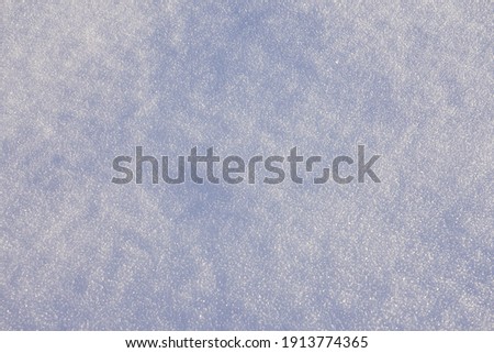 Snow on a frosty day as a natural white background.