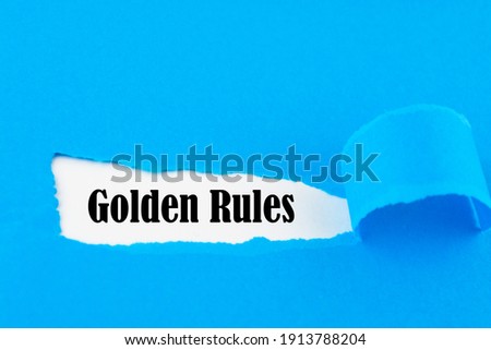Torn Paper With Text " Golden Rules "