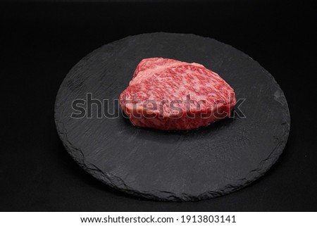 Kobe A4 Tenderloin. Kobe beef is some of the rarest and most highly-prized varieties of wagyu, and commonly fetches some of the highest price tags for beef in the world.  Royalty-Free Stock Photo #1913803141