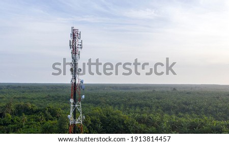 Telecommunication tower with 5G cellular network antenna Royalty-Free Stock Photo #1913814457