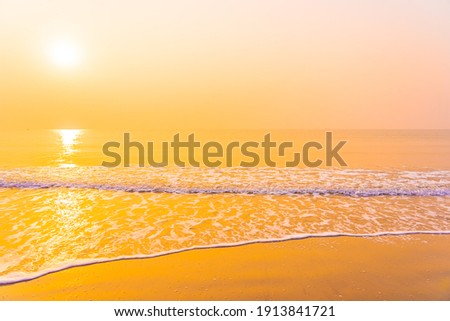 Beautiful tropical beach sea ocean with sky at sunrise or sunset time