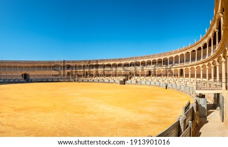 Panoramic view to Plaza de Toros de Ronda Bullring one of the oldest and most famous bullfighting arena in Spain. Ronda, Andalucia, Spain Royalty-Free Stock Photo #1913901016